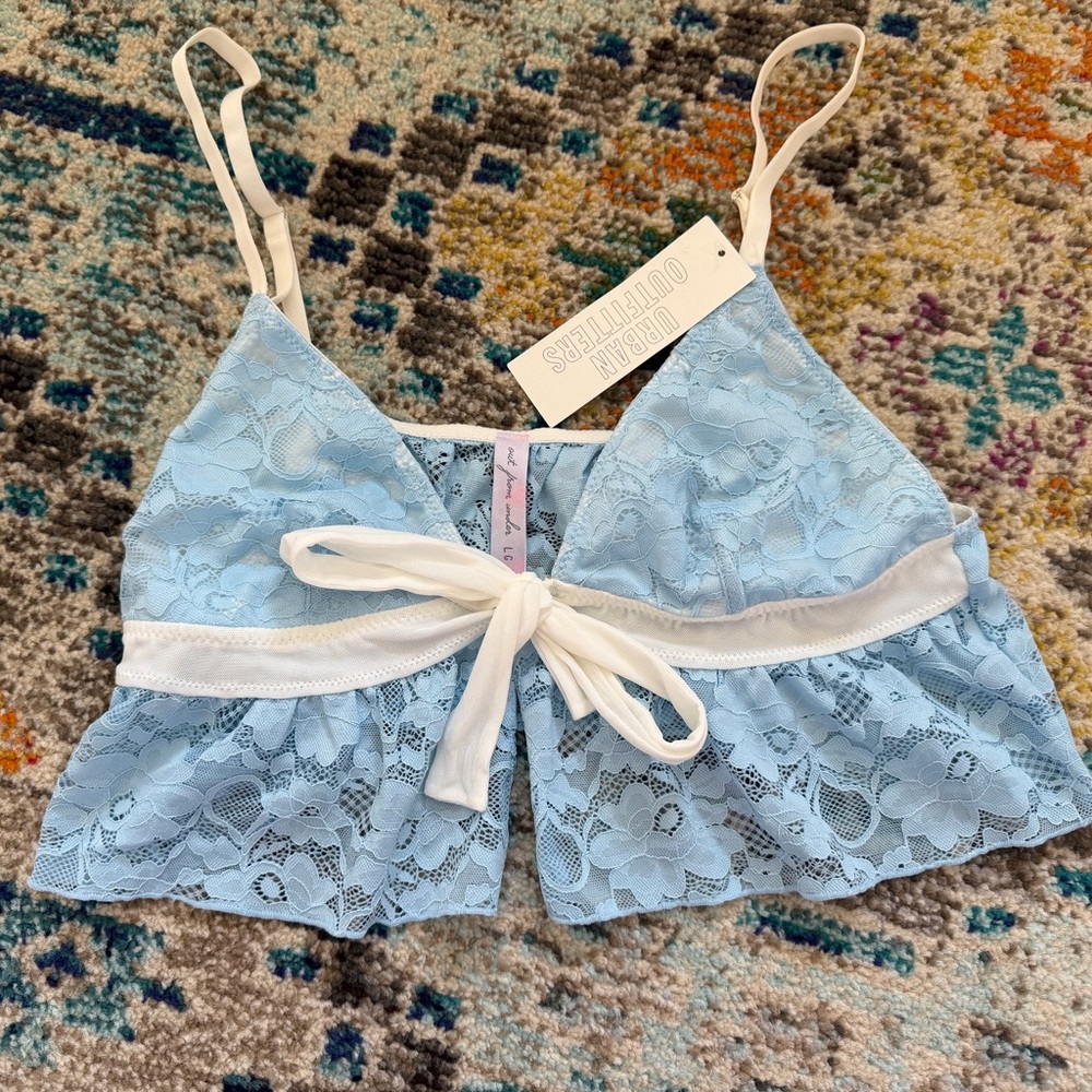 Urban Outfitters out from under crop top